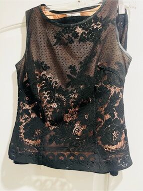 Black Lace Overlay top with Nude Lining
With matching mini skirt